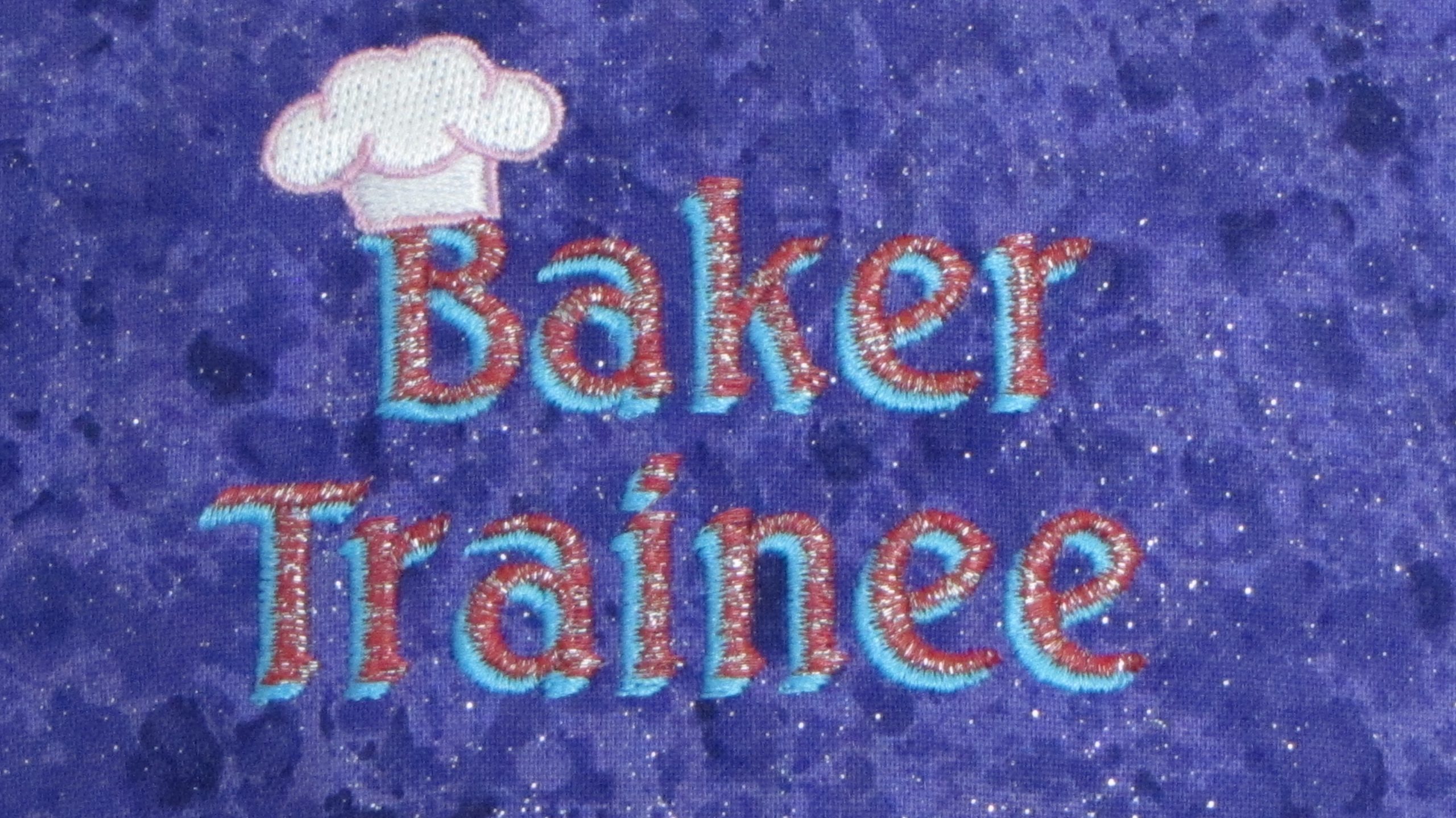 baker trainee on purple